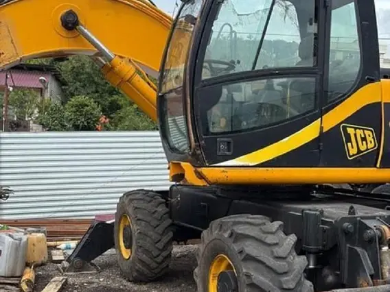 Экскаватор JCB JS 130W 2003 года б/у