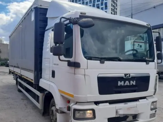 Тентованный грузовик MAN TGL 2017 года б/у фото 5