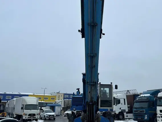 Грейферный погрузчик FUCHS MHL 360 2002 года б/у фото 2