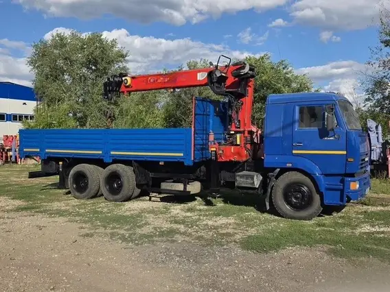 Бортовой грузовик КАМАЗ 65117-62 с КМУ FASSI, 2009 2009 года б/у
