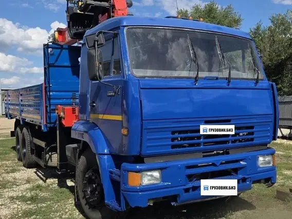 Бортовой грузовик КАМАЗ 65117-62 с КМУ FASSI, 2009 2009 года б/у фото 2