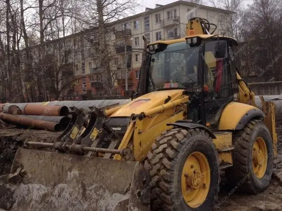 Экскаватор-погрузчик Komatsu WB97 2011 года б/у