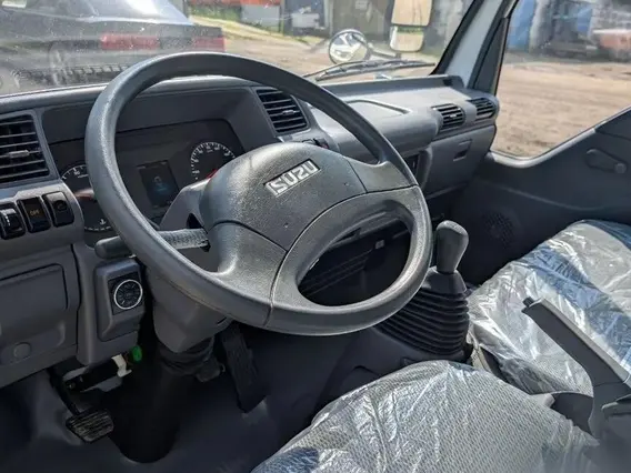 Бортовой грузовик Isuzu Elf 2026 года новый фото 11