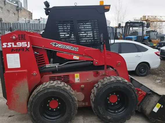Фронтальный погрузчик QUADTRAC SSL95J MAX 2023 года б/у фото 3