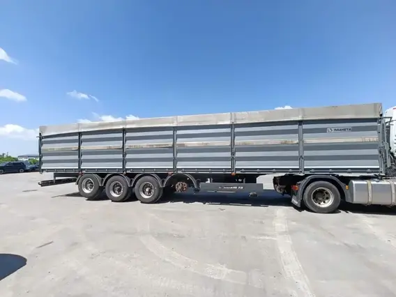 Полуприцеп-зерновоз ПЛАНЕТА 5529T1 2023 года б/у фото 4