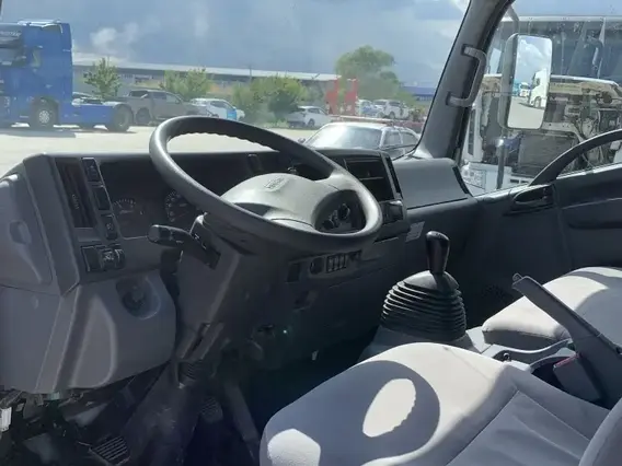 Тентованный грузовик Isuzu Elf 2020 года б/у фото 10