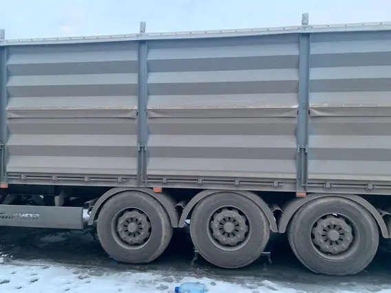 Полуприцеп-зерновоз ПЛАНЕТА 5529T1 2023 года б/у фото 4