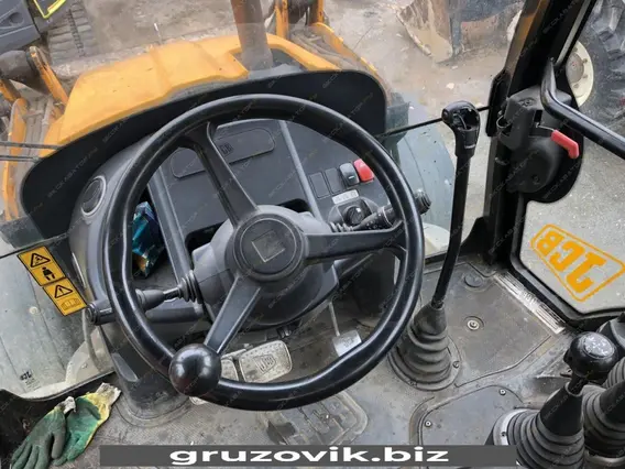 Экскаватор-погрузчик JCB 3CX 2012 года б/у