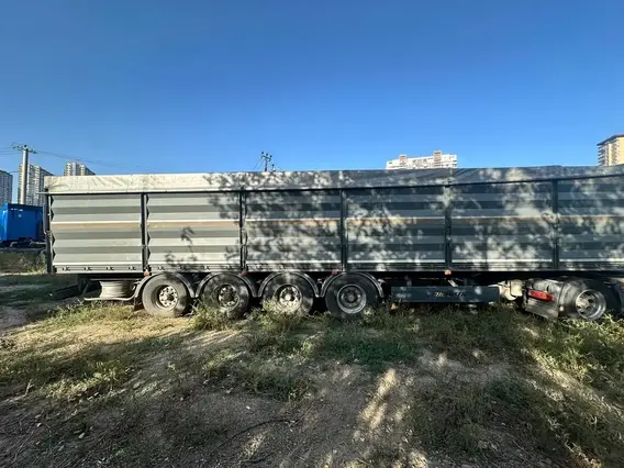 Полуприцеп-зерновоз ПЛАНЕТА 5529T1 2023 года б/у фото 6
