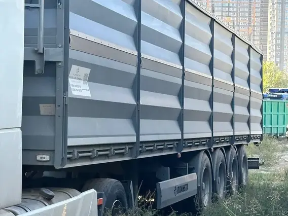 Полуприцеп-зерновоз ПЛАНЕТА 5529T1 2023 года б/у фото 2