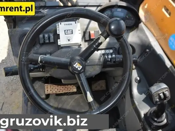 Телескопический погрузчик Caterpillar TH406 2008 года б/у