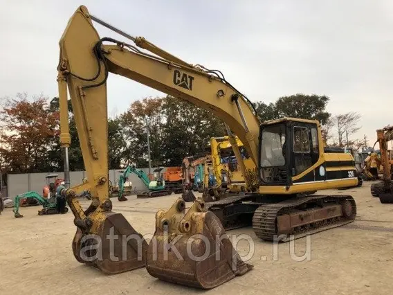 Экскаватор-погрузчик Caterpillar 320  б/у