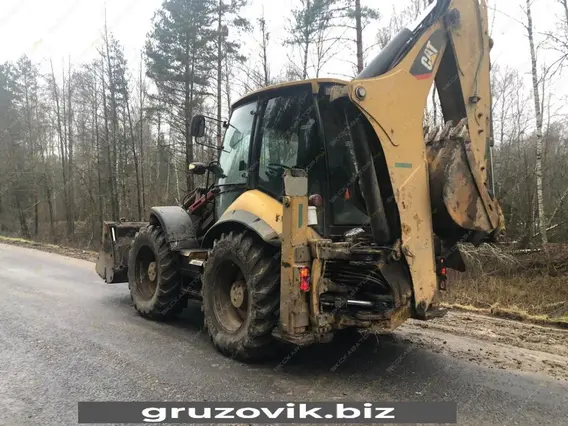 Экскаватор-погрузчик Caterpillar 444 2013 года б/у