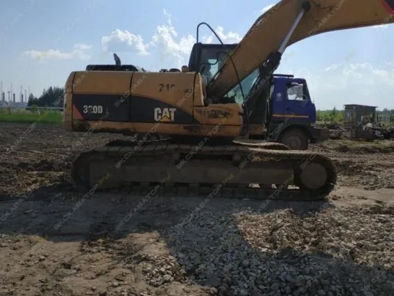Экскаватор Caterpillar 320 2011 года б/у