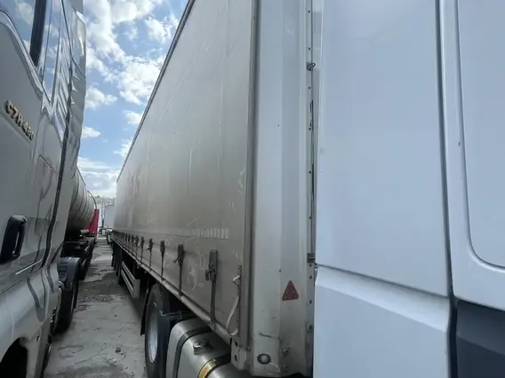 Грузовой полуприцеп общего назначения GRUNWALD 9453 2021 года б/у фото 4