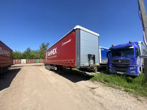 Грузовой полуприцеп общего назначения GRUNWALD 9453 2024 года б/у фото 2