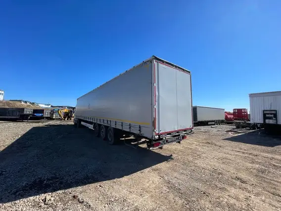 Тентованный полуприцеп Krone SD 2022 года б/у фото 5