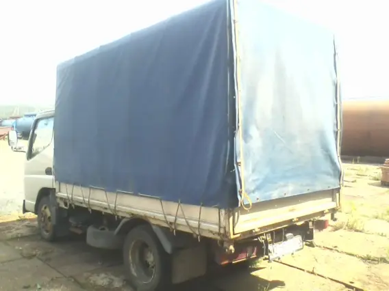 Тентованный грузовик Mitsubishi Canter 2003 года б/у фото 17