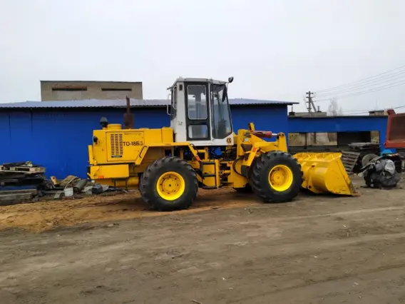 Фронтальный погрузчик амкадор ТО18Б3 2005 года б/у фото 3