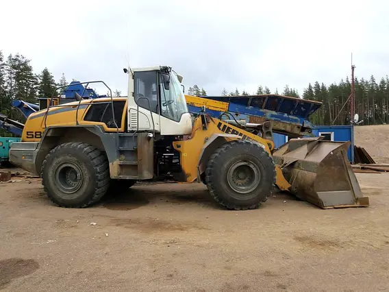 Фронтальный погрузчик Liebherr L580 2014 года б/у