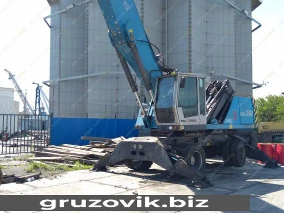 FUCHS MHL 360 2012 года б/у фото 6