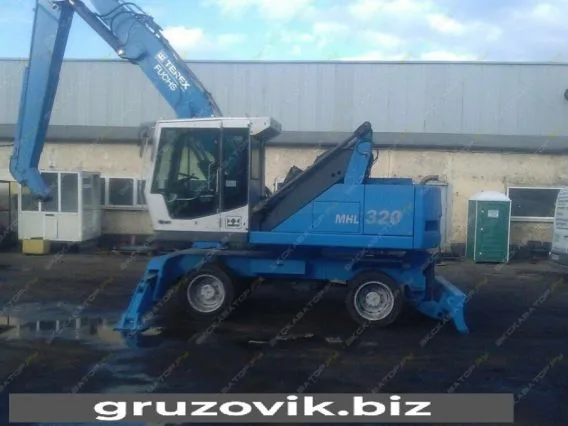 FUCHS MHL 320 2005 года б/у фото 10