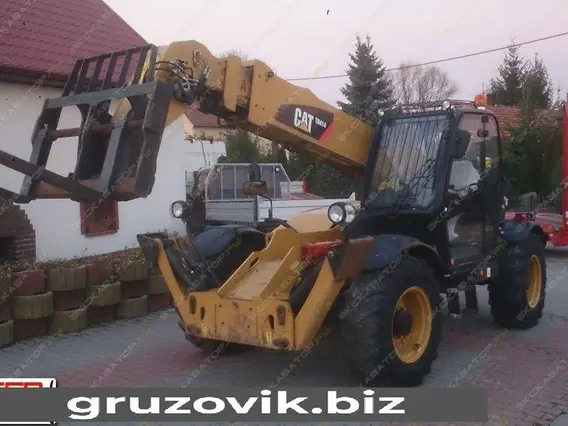 Телескопический погрузчик Caterpillar TH414 2010 года б/у
