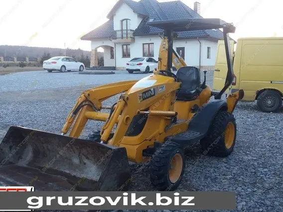 Фронтальный погрузчик JCB MINI CX 2006 года б/у фото 8