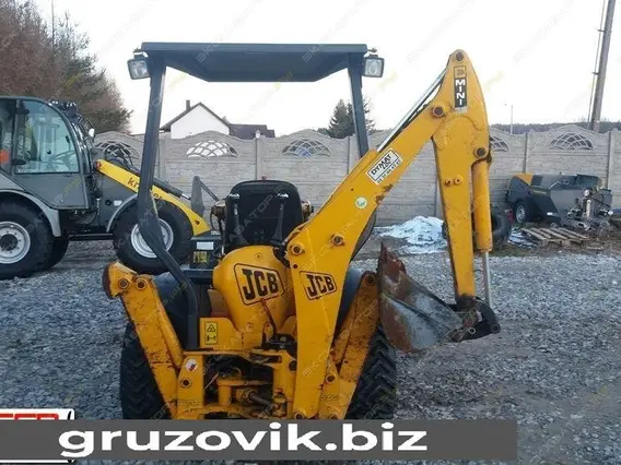 Фронтальный погрузчик JCB MINI CX 2006 года б/у фото 9