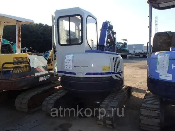 Экскаватор Caterpillar MM30SR-3 2005 года б/у фото 2