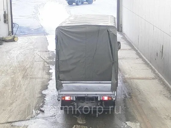 Тентованный грузовик Nissan ATLAS SZ2F24 2010 года б/у фото 3