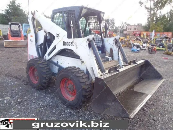 Фронтальный погрузчик Bobcat 873 2002 года б/у фото 3