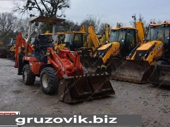 Экскаватор-погрузчик Kubota R420 2005 года б/у