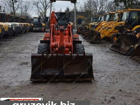 Экскаватор-погрузчик Kubota R420 2005 года б/у фото 2