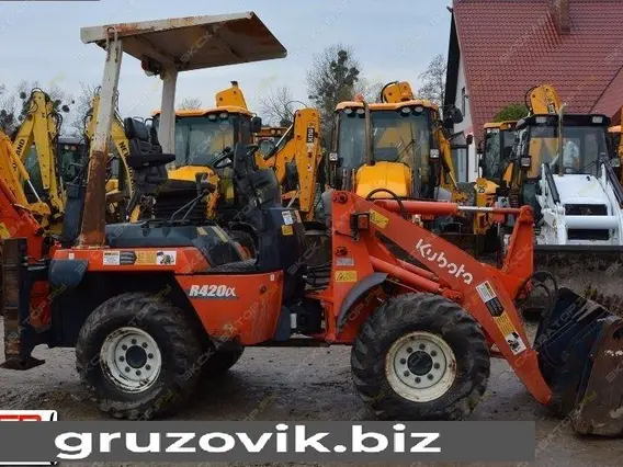 Экскаватор-погрузчик Kubota R420 2005 года б/у фото 7