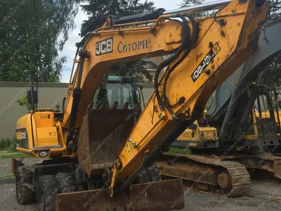 Экскаватор-погрузчик JCB JS 160W 2010 года б/у фото 2