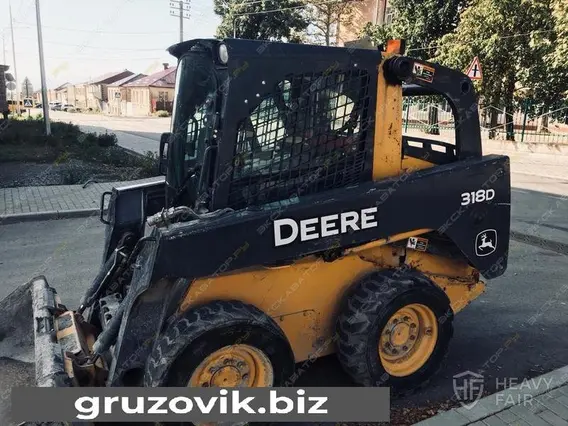 Фронтальный погрузчик John Deere 318d 2013 года б/у фото 2