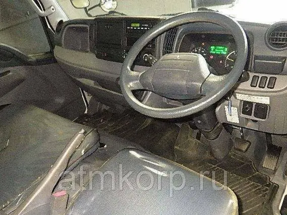 Тентованный грузовик MITSUBISHI CANTER FBA00 2011 года б/у фото 3