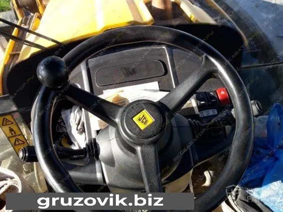 Экскаватор-погрузчик JCB 4CX14 2013 года новый фото 6