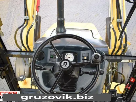 Экскаватор-погрузчик New Holland B100B 2012 года б/у фото 9