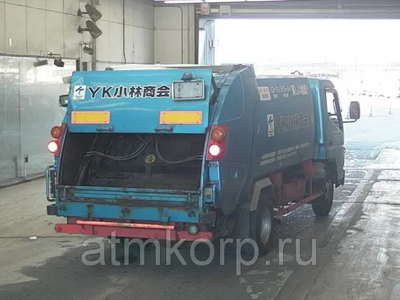 Мусоровоз Mitsubishi CANTER кузов FE83DY 2010 года б/у фото 2