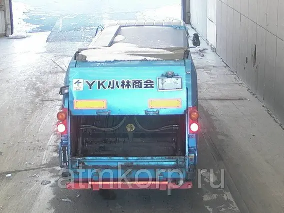 Мусоровоз Mitsubishi CANTER кузов FE83DY 2010 года б/у фото 3