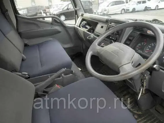 Самопогрузчик Mitsubishi CANTER FE83DY 2010 года б/у фото 3