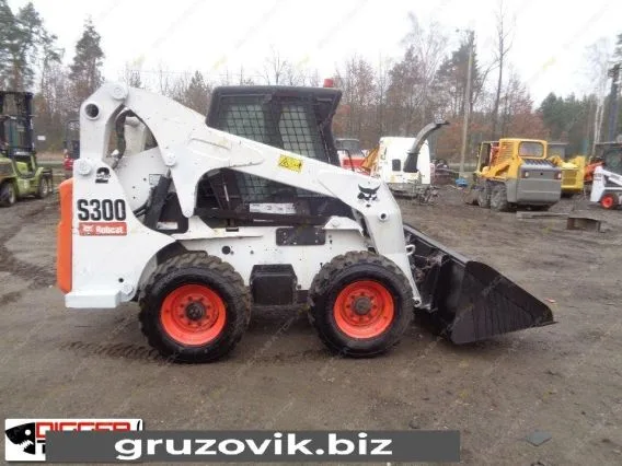Фронтальный погрузчик Bobcat S300 2007 года б/у фото 7