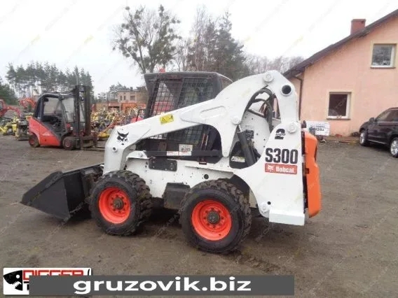 Фронтальный погрузчик Bobcat S300 2007 года б/у фото 4
