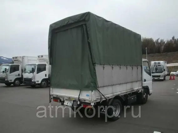 Тентованный грузовик Mitsubishi CANTER FB70B 2010 года б/у фото 2