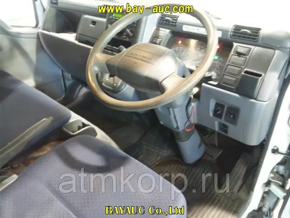 Тентованный грузовик Mitsubishi CANTER FE70B 2009 года б/у фото 3