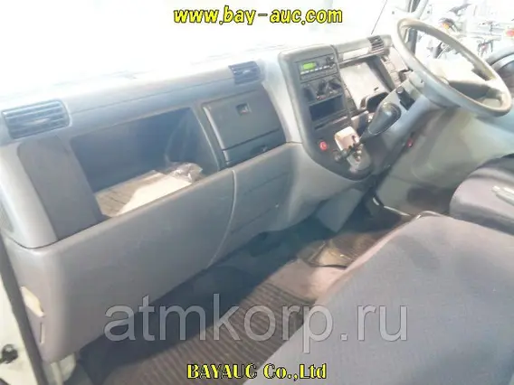 Тентованный грузовик Mitsubishi CANTER FE70B 2009 года б/у фото 6