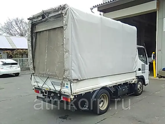 Тентованный грузовик Mitsubishi CANTER FE70BS 2010 года б/у фото 3