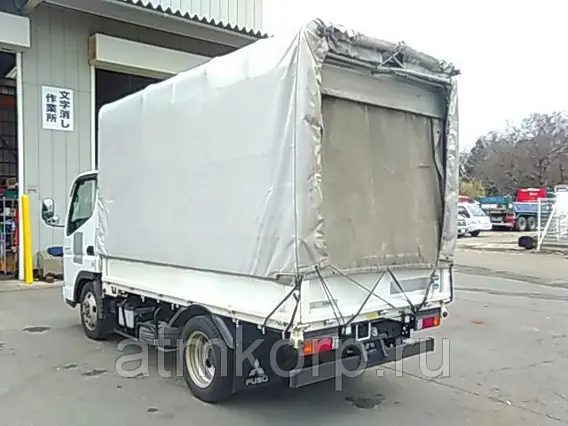 Тентованный грузовик Mitsubishi CANTER FE70BS 2010 года б/у фото 5